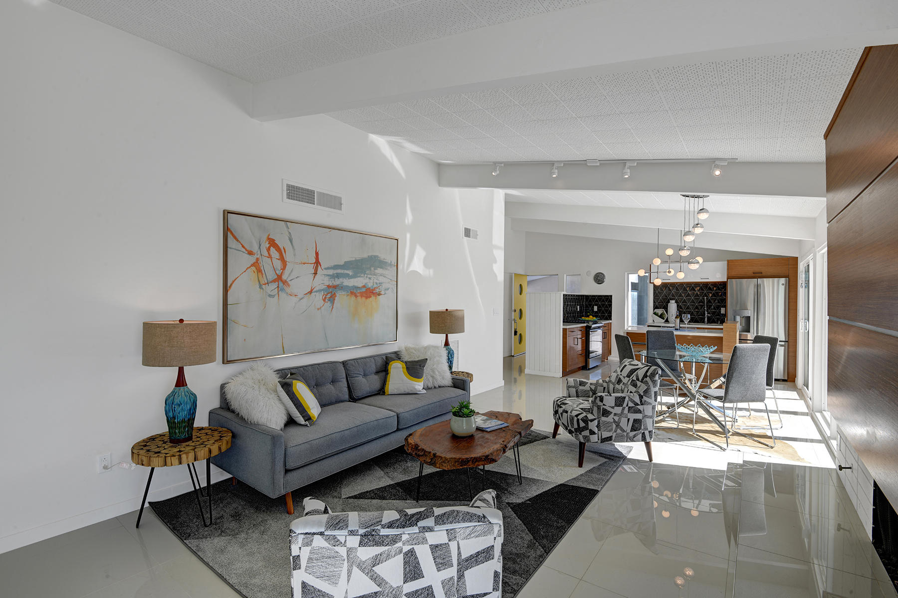 909 East Sunair Road Palm Springs, CA 92262 - Photo 8 of 39 LIVING ROOM REVERSE TO DINING ROOM AND K