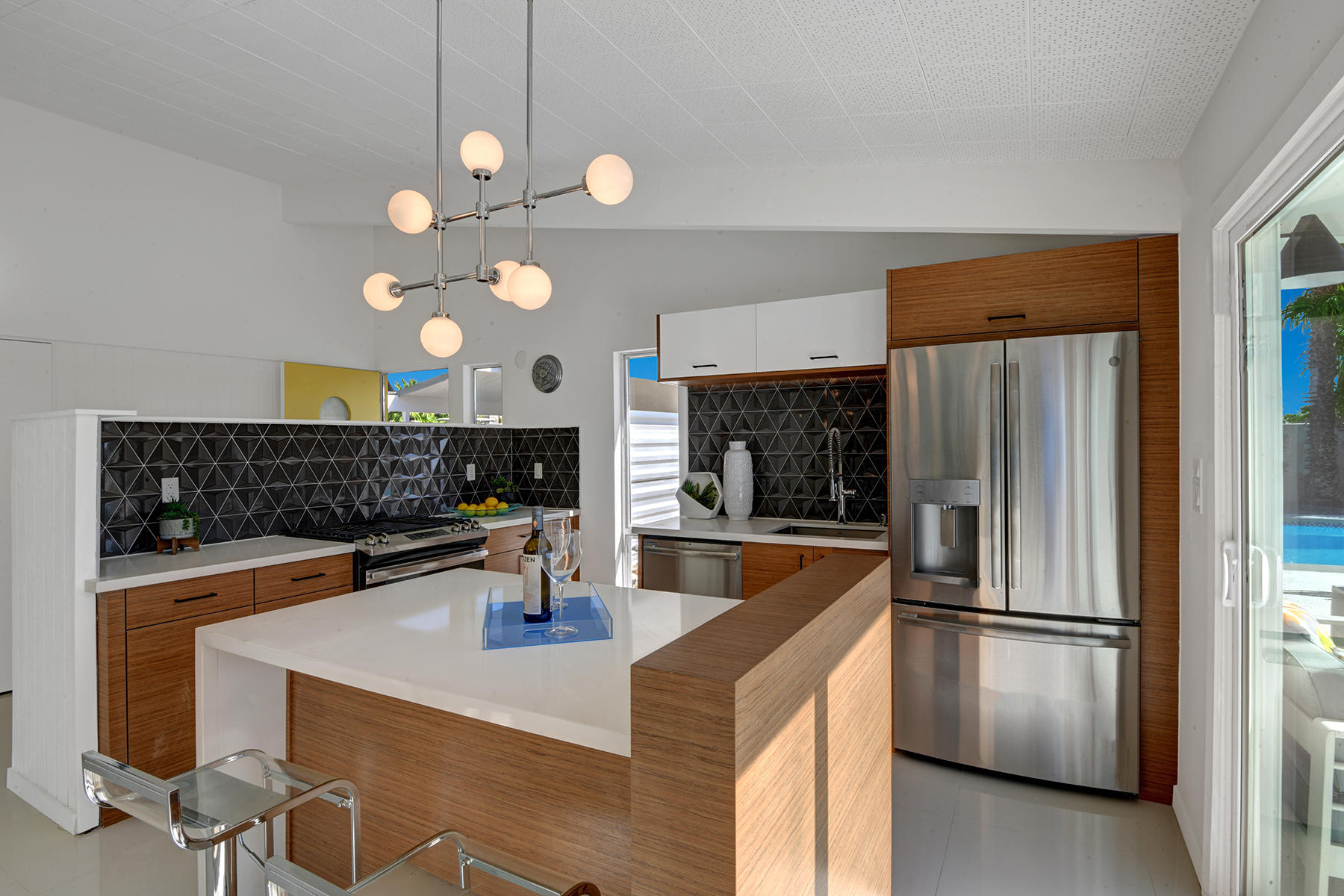 909 East Sunair Road Palm Springs, CA 92262 - Photo 10 of 39 KITCHEN ANGLED OVER BREAKFAST BAR MLS