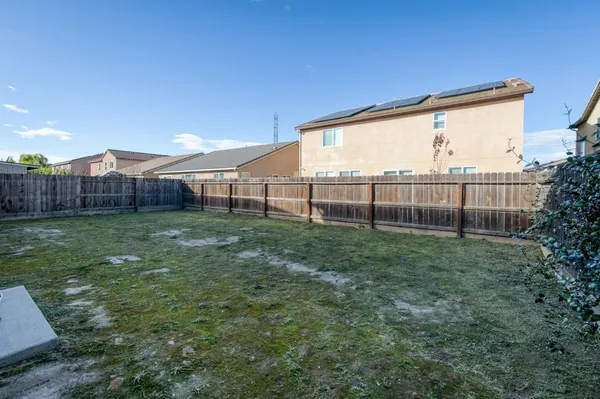 a view of a backyard with a garden