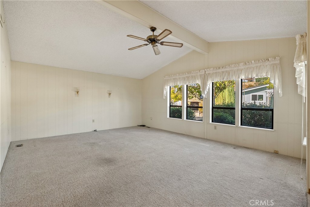 340 Nightingale Avenue Paso Robles, CA 93446 - Photo 11 of 41 a view of a big room with windows and chandelier fan