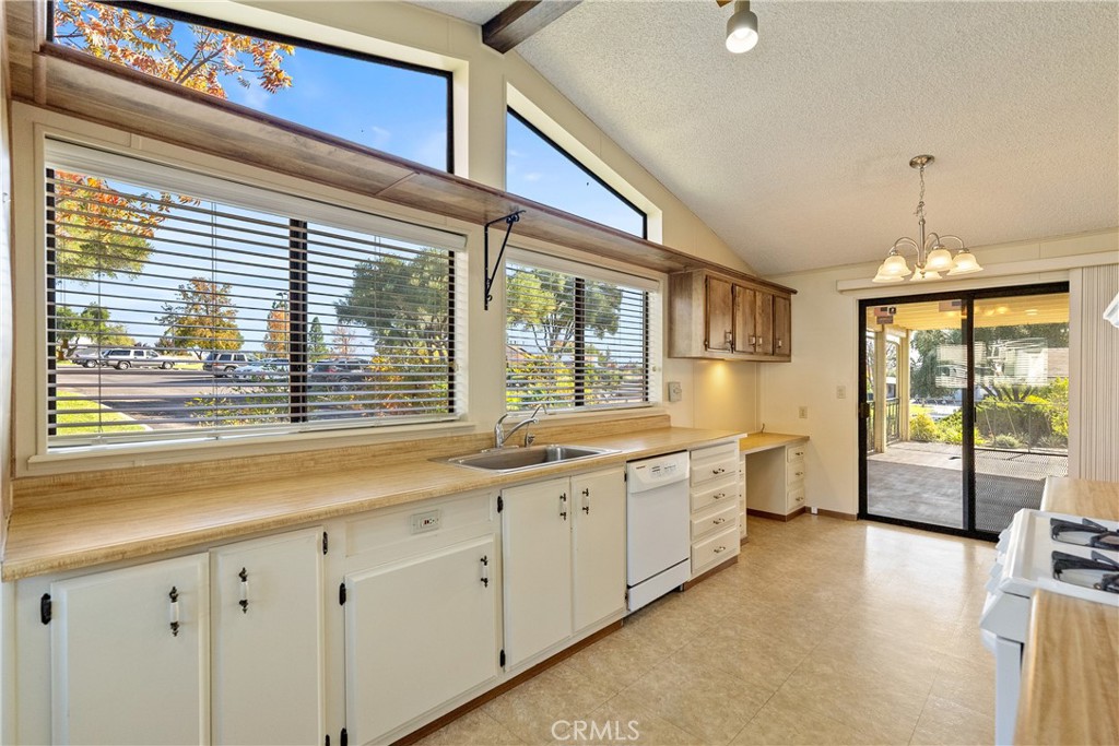 340 Nightingale Avenue Paso Robles, CA 93446 - Photo 14 of 41 a large white kitchen with a large window