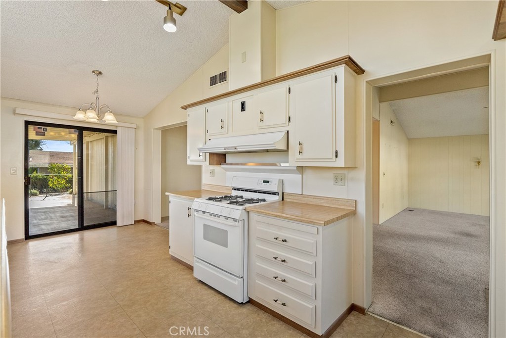 340 Nightingale Avenue Paso Robles, CA 93446 - Photo 16 of 41 a kitchen with white cabinets and white appliances
