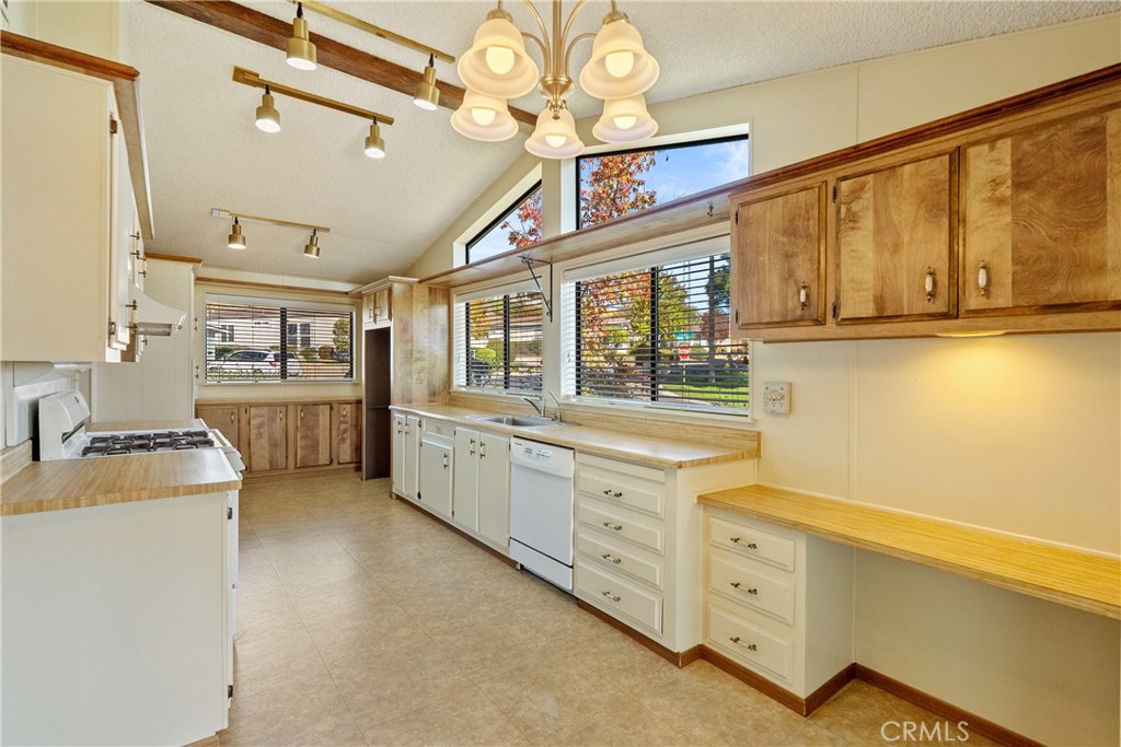 340 Nightingale Avenue Paso Robles, CA 93446 - Photo 18 of 41 a kitchen with cabinets appliances and a large window