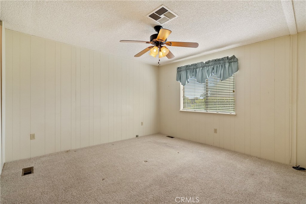 340 Nightingale Avenue Paso Robles, CA 93446 - Photo 25 of 41 an empty room with windows and fan