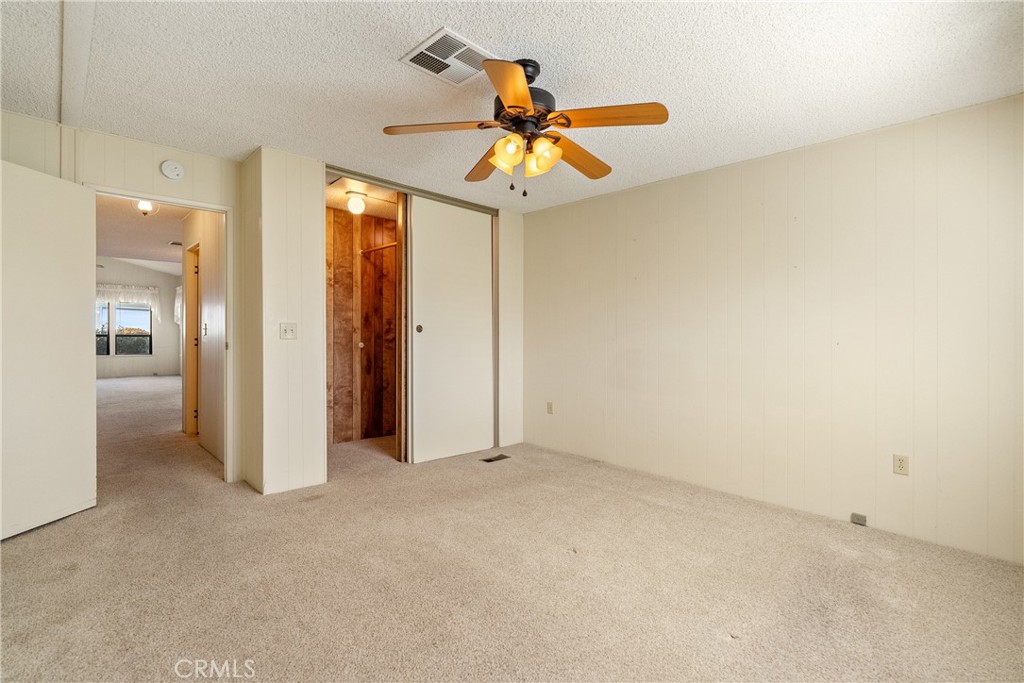 340 Nightingale Avenue Paso Robles, CA 93446 - Photo 26 of 41 a view of an empty room and a ceiling fan