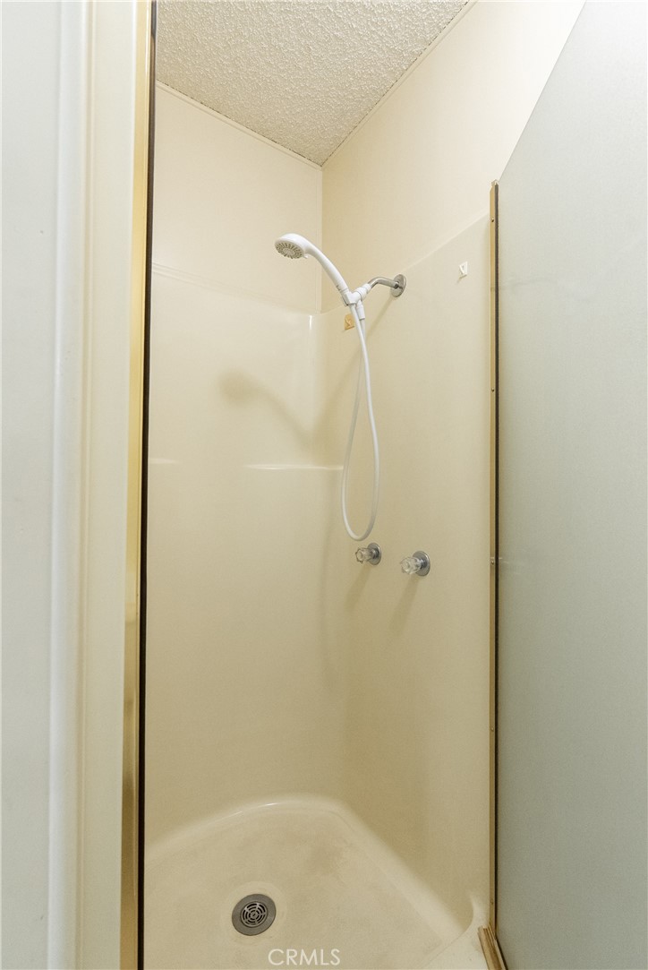 340 Nightingale Avenue Paso Robles, CA 93446 - Photo 31 of 41 a bathroom with a glass shower door