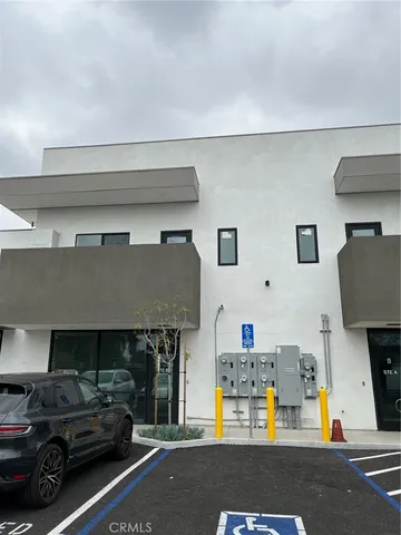 a car parked in front of a building