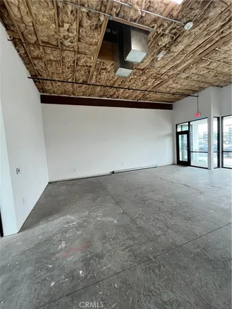 a view of a wooden floor and a tree