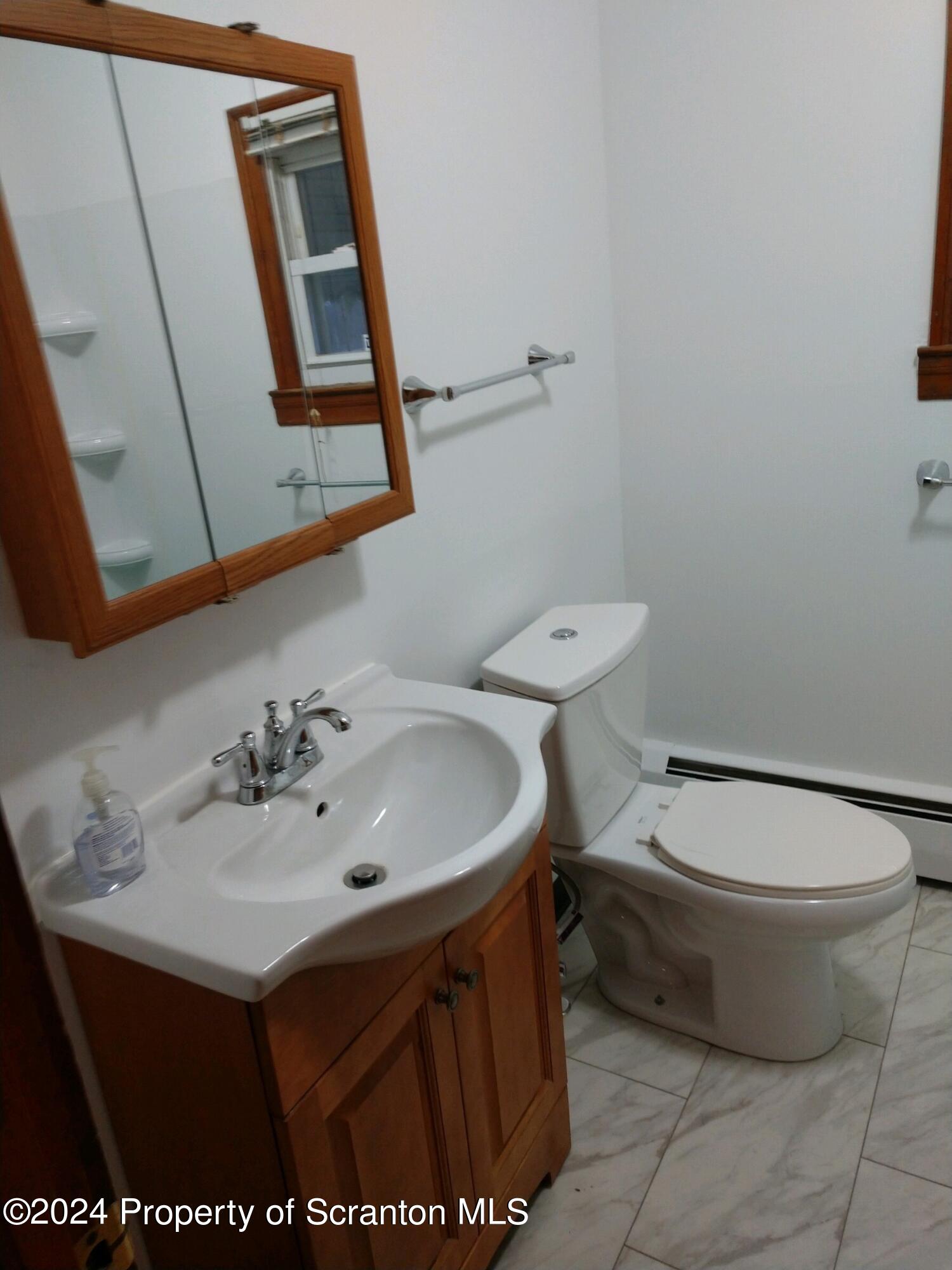 1357 North Main Avenue, Unit 2 Scranton, PA 18508 - Photo 5 of 13 1357NMainAve2ndFlrbathvanity