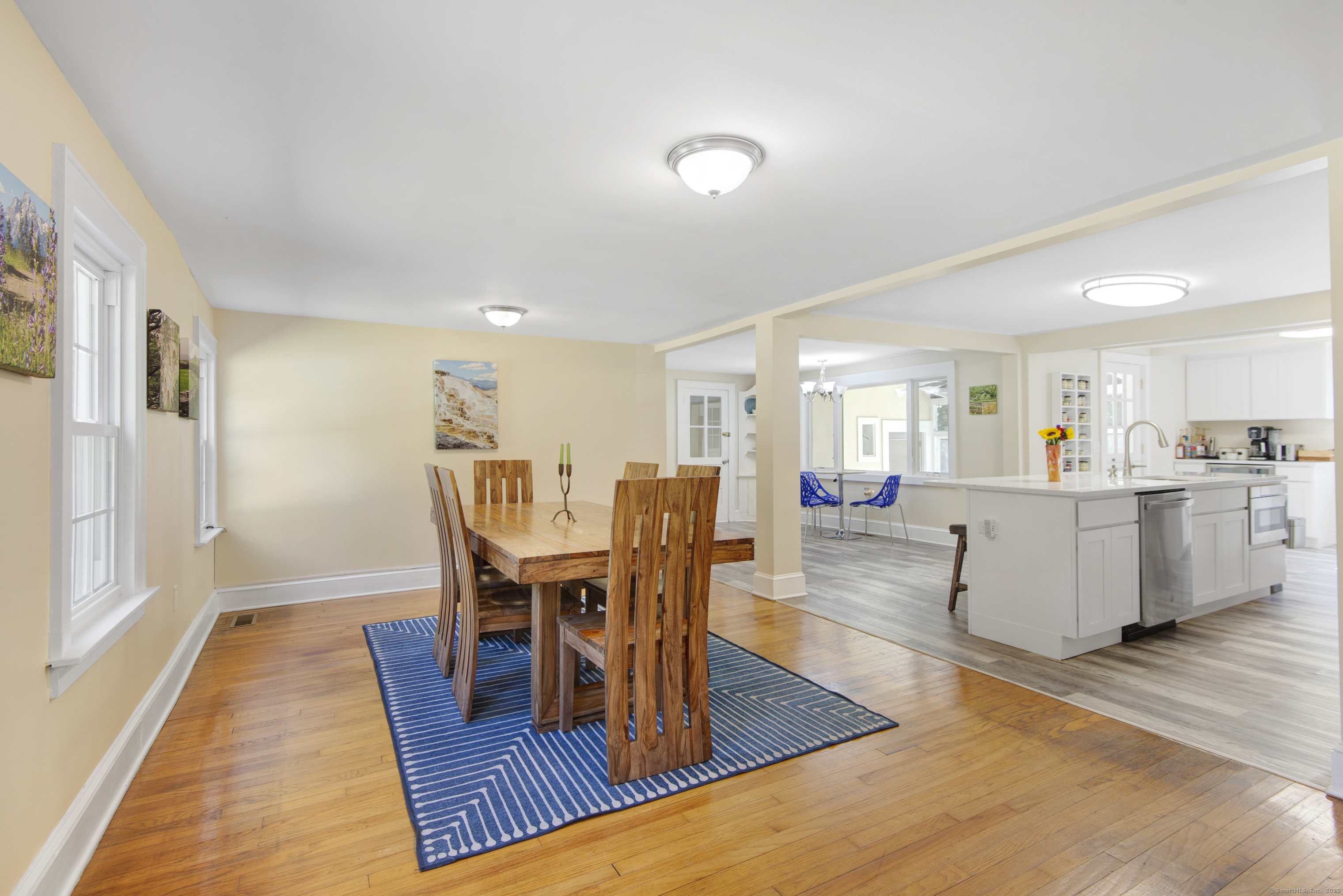 112 Cedar Swamp Road Deep River, CT 06417 - Photo 16 of 37 a view of a dining room with furniture and wooden floor