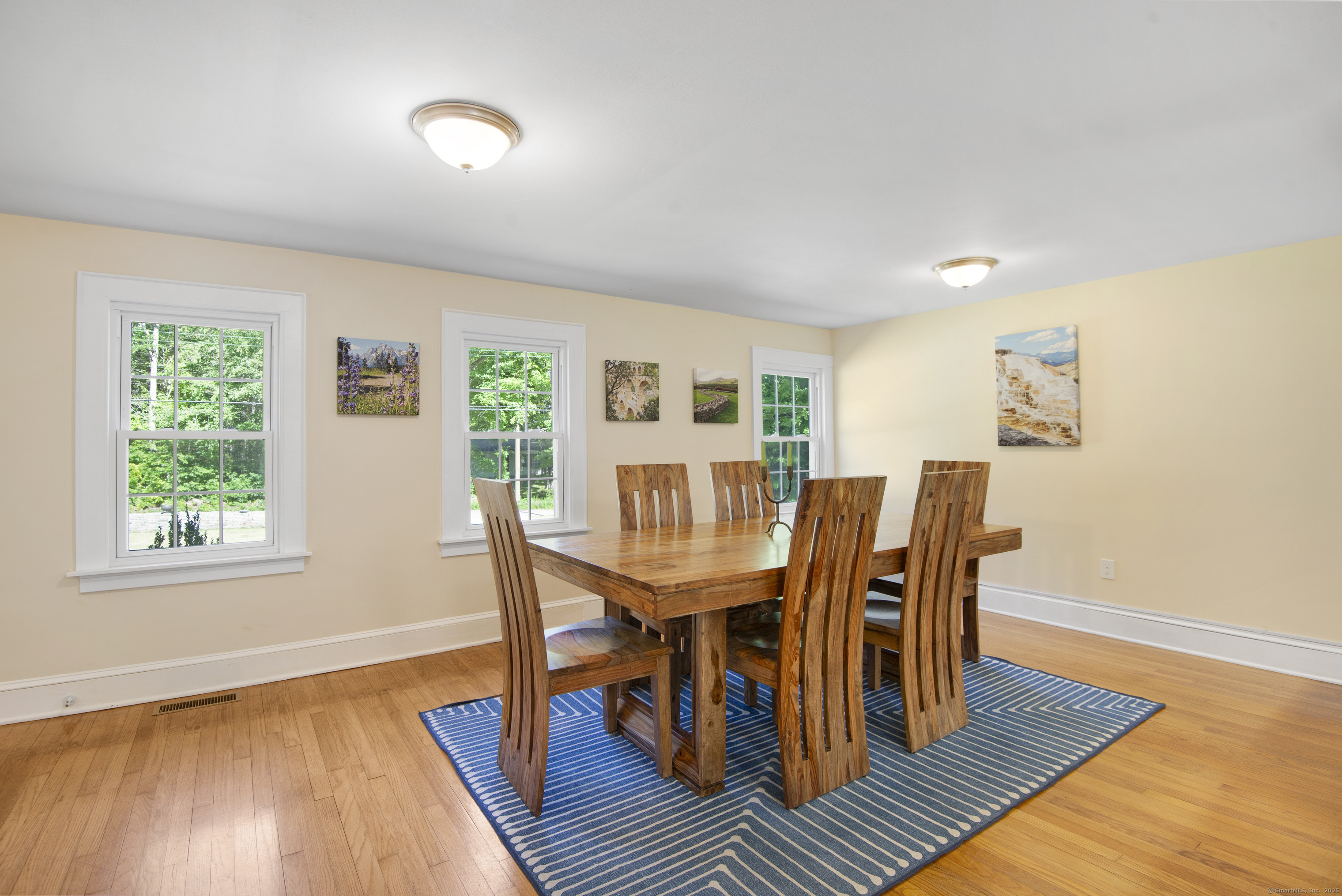112 Cedar Swamp Road Deep River, CT 06417 - Photo 17 of 37 a view of a dining room with furniture window and wooden floor