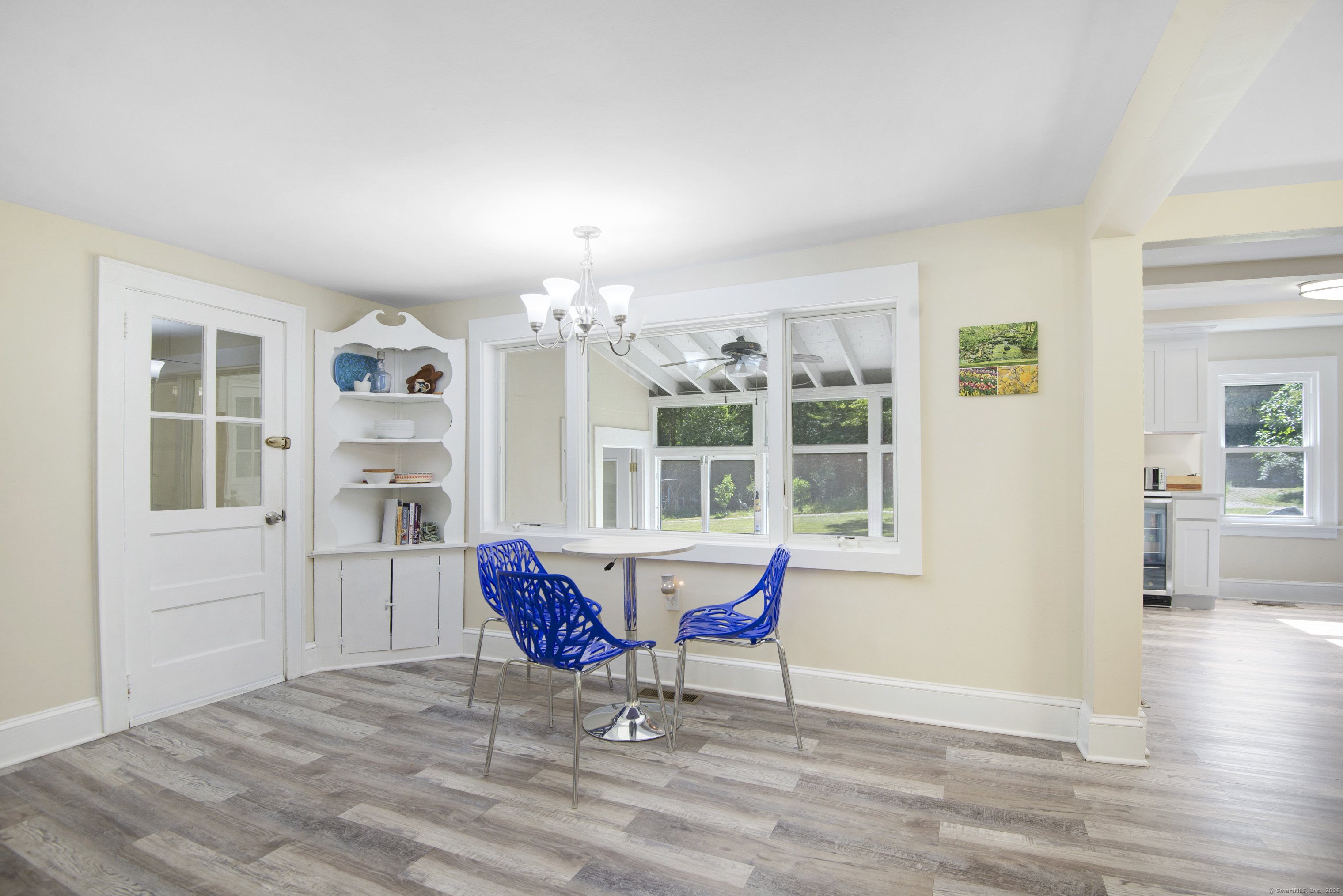 112 Cedar Swamp Road Deep River, CT 06417 - Photo 19 of 37 a view of a dining room with furniture window and wooden floor