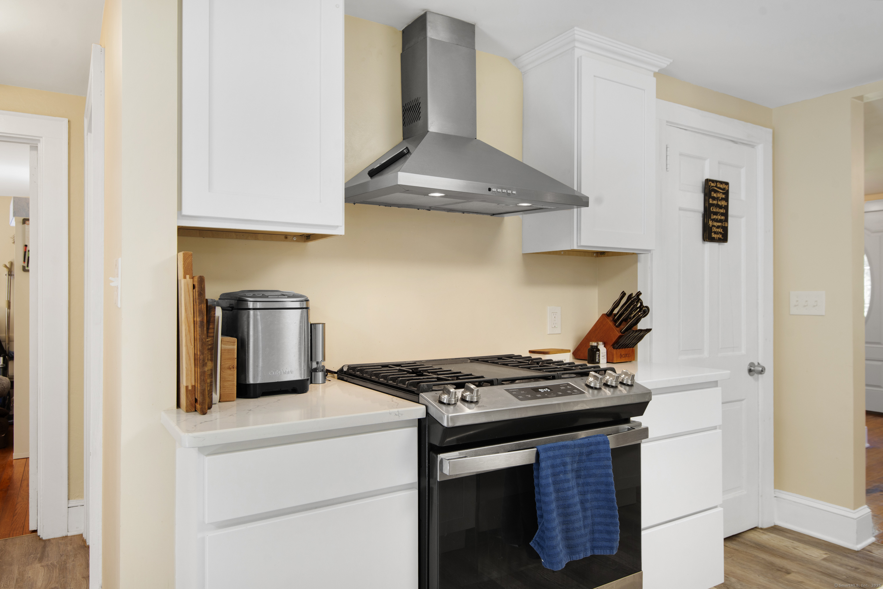 112 Cedar Swamp Road Deep River, CT 06417 - Photo 21 of 37 a kitchen with stainless steel appliances granite countertop a stove and a refrigerator