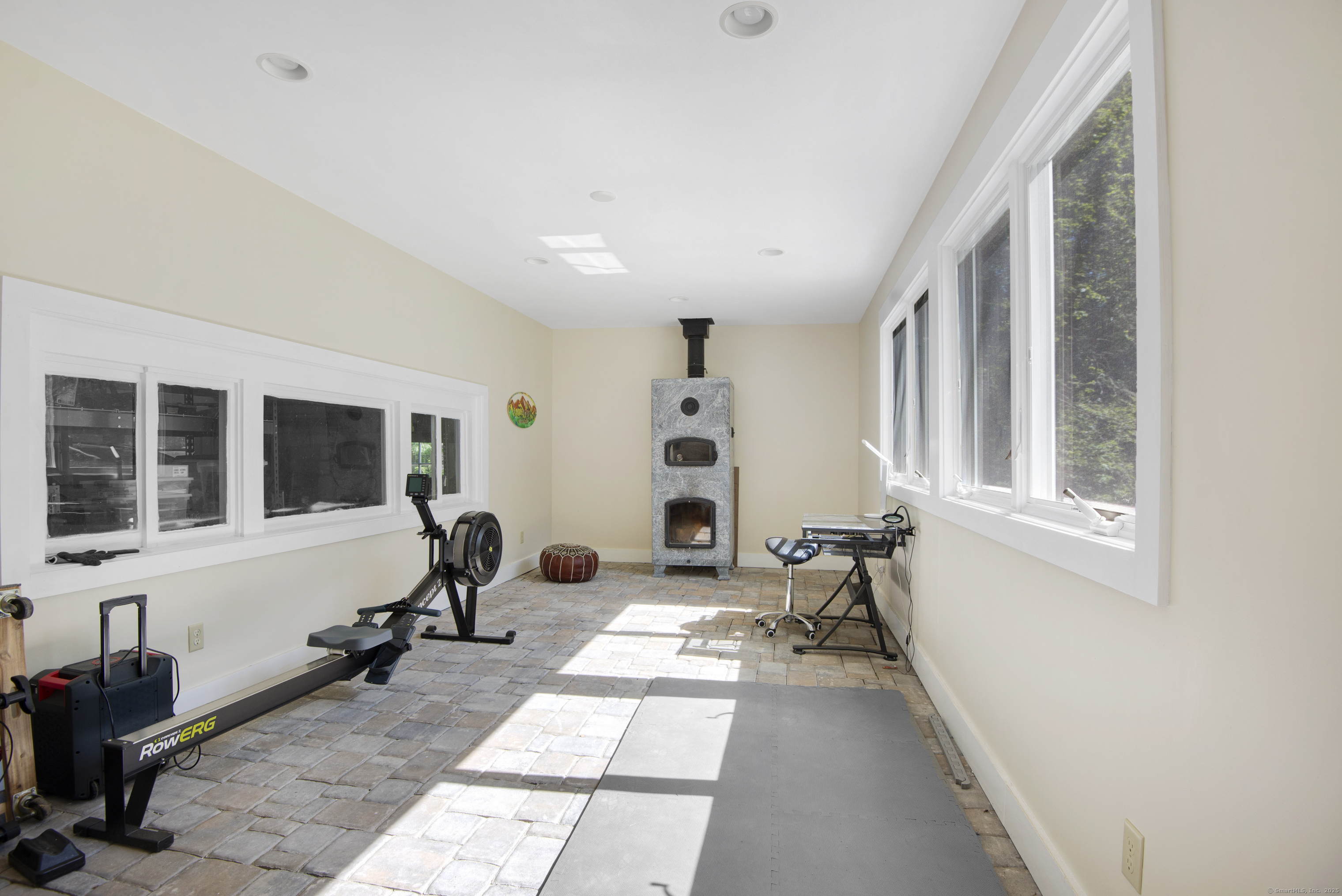 112 Cedar Swamp Road Deep River, CT 06417 - Photo 24 of 37 a view of a room with gym equipment and windows