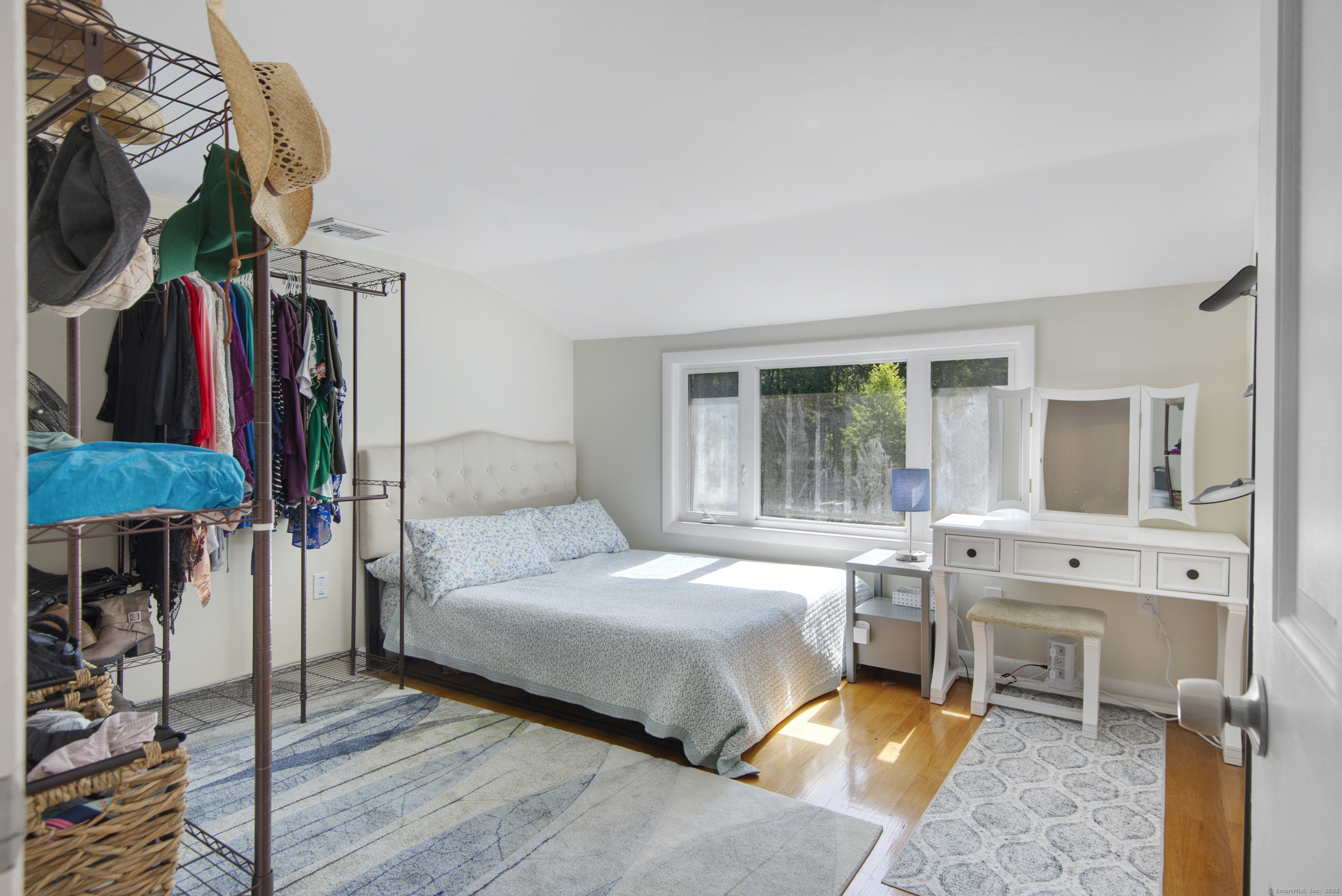 112 Cedar Swamp Road Deep River, CT 06417 - Photo 28 of 37 a bedroom with a bed and a window