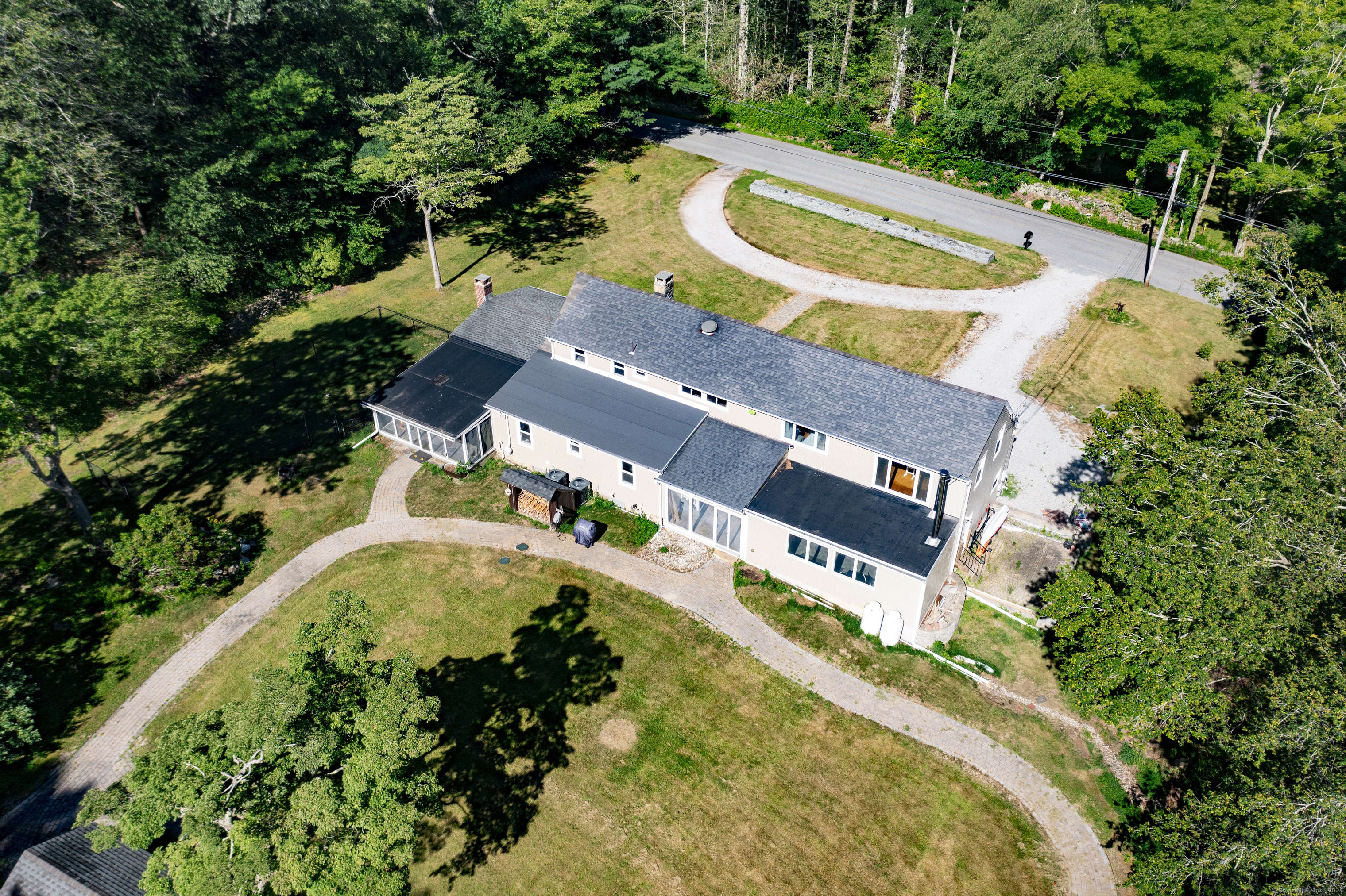 112 Cedar Swamp Road Deep River, CT 06417 - Photo 32 of 37 an aerial view of a house with a swimming pool