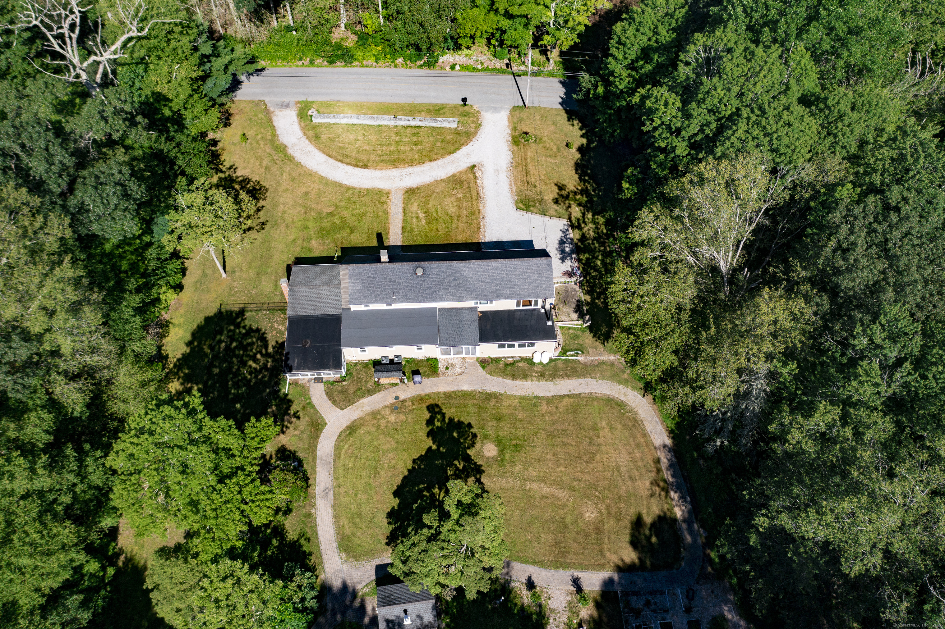 112 Cedar Swamp Road Deep River, CT 06417 - Photo 4 of 37 an aerial view of a house with outdoor space