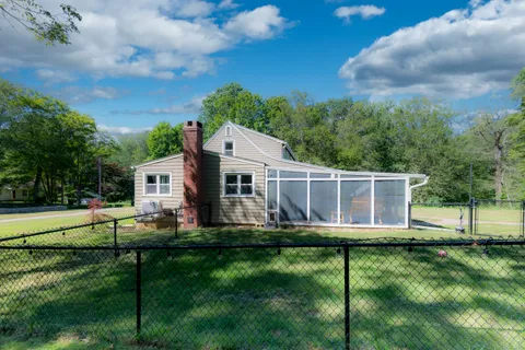 a house view with a garden space