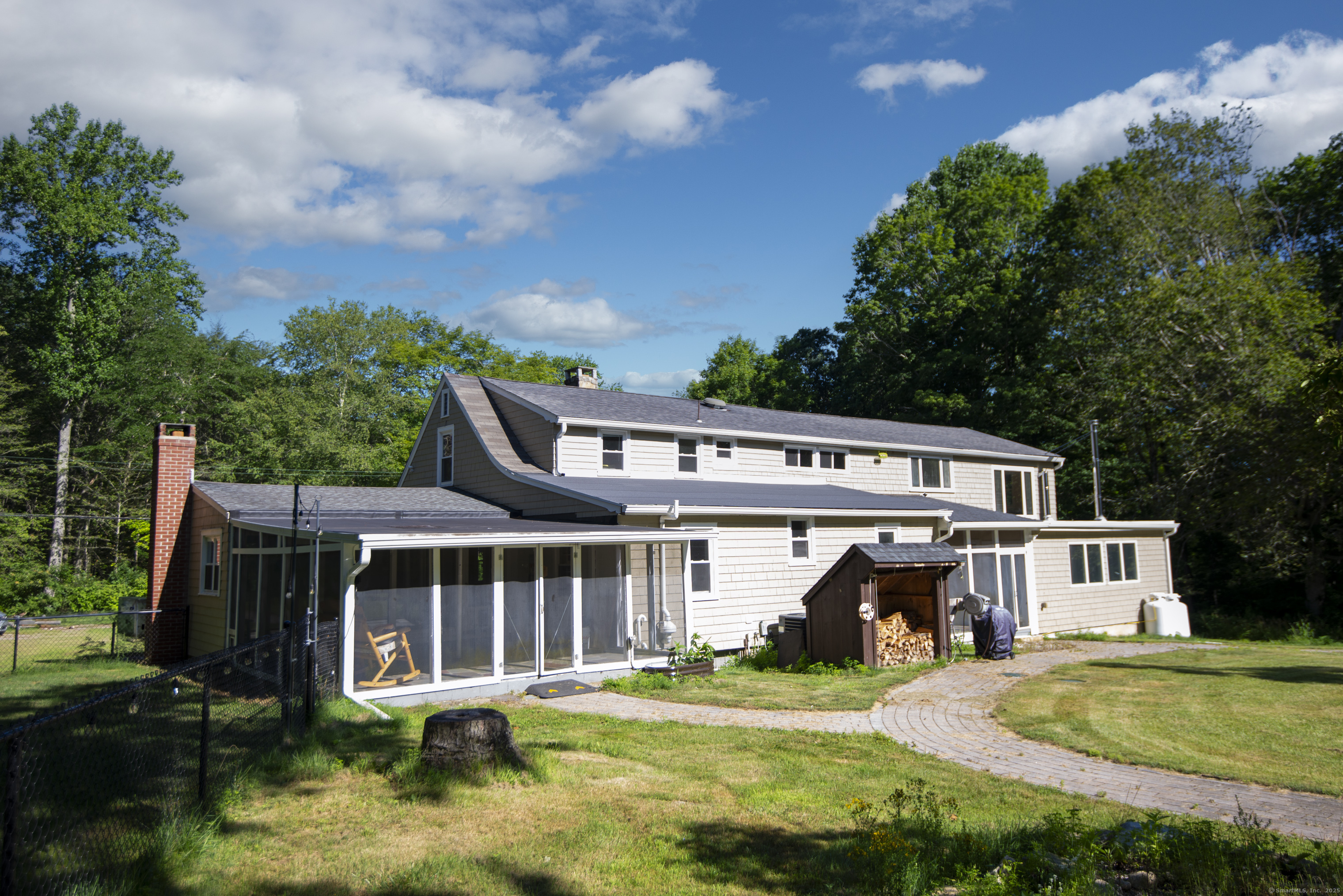 112 Cedar Swamp Road Deep River, CT 06417 - Photo 5 of 37 a view of a house with yard and sitting area