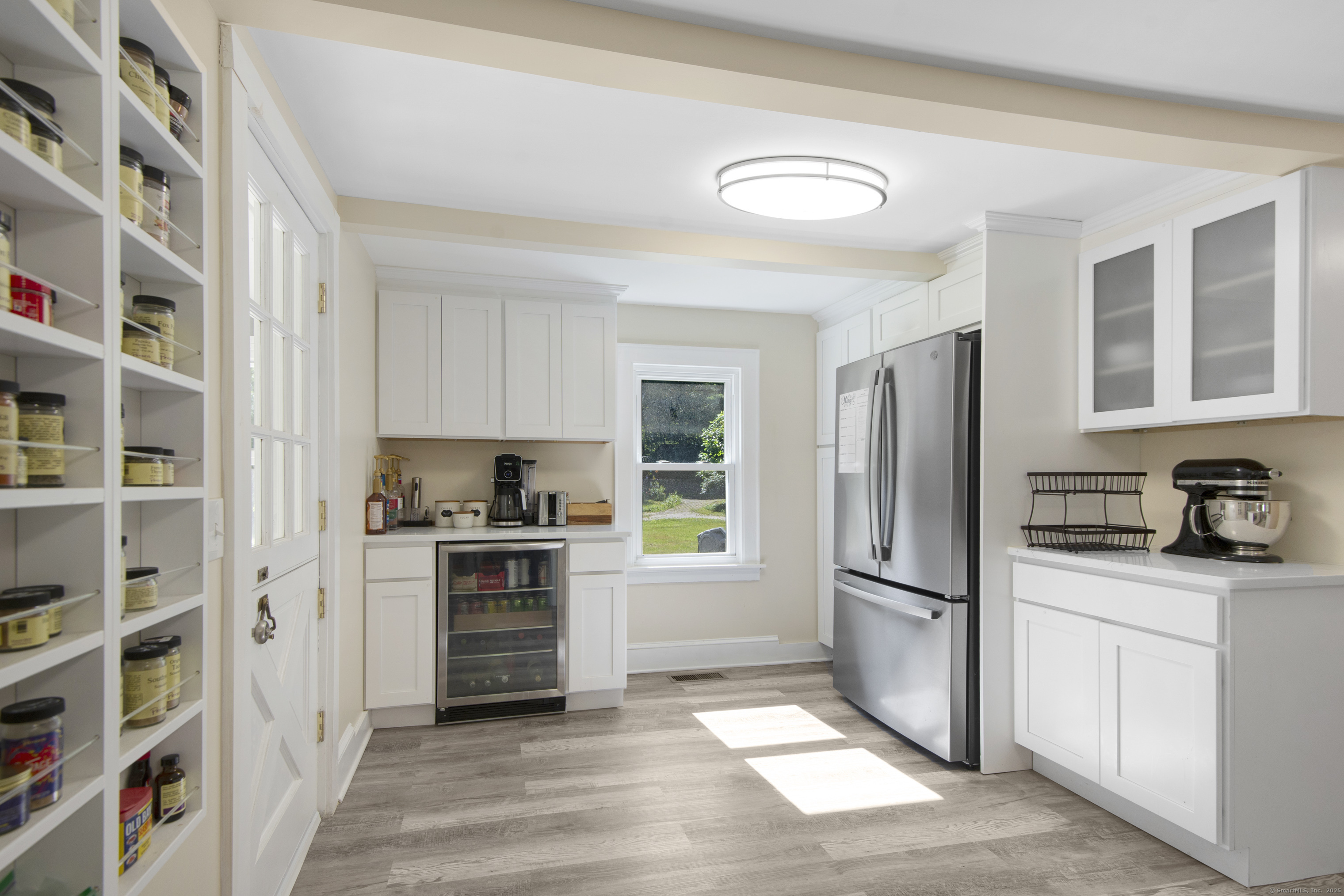 112 Cedar Swamp Road Deep River, CT 06417 - Photo 7 of 37 a kitchen with granite countertop a refrigerator and a stove top oven