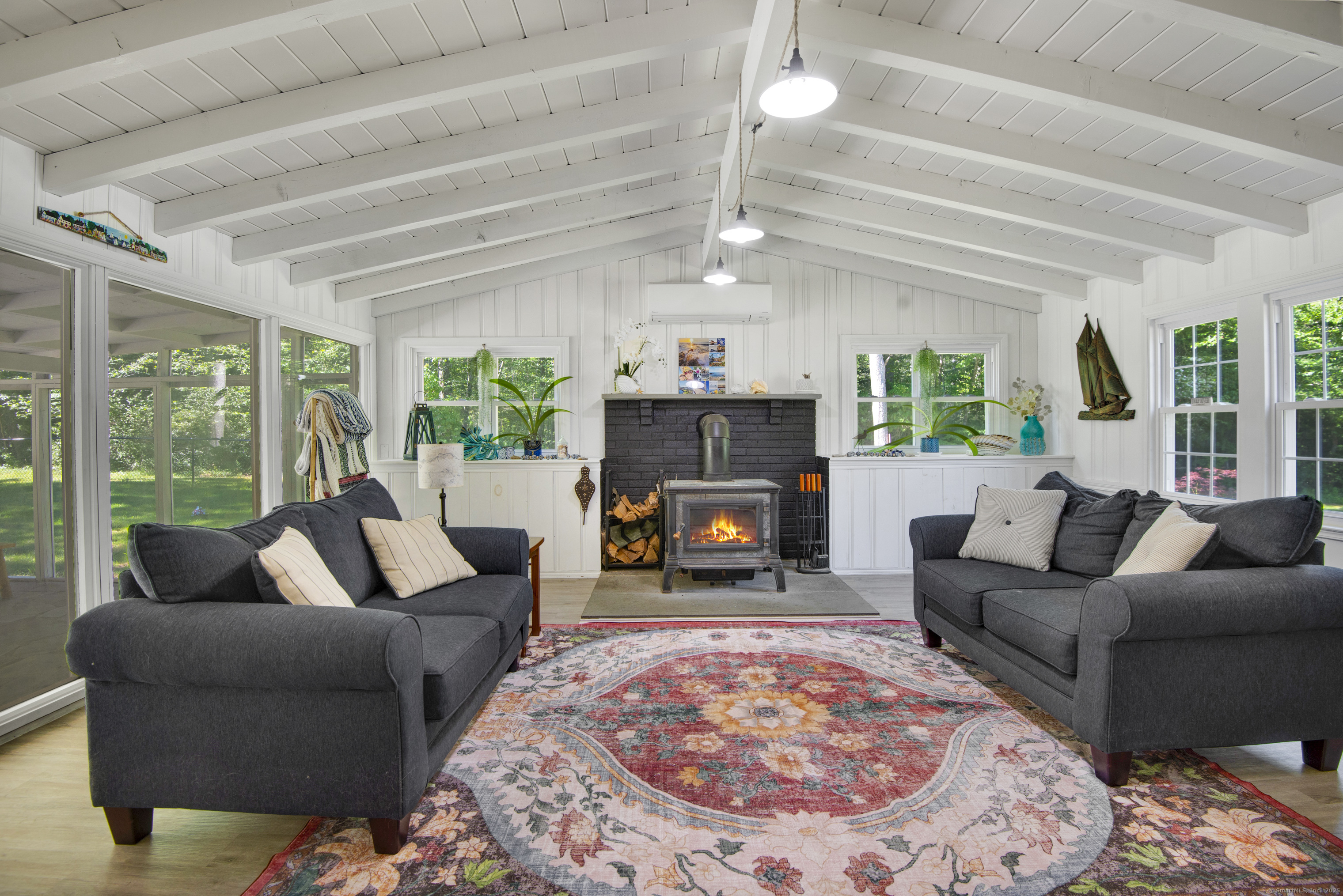 112 Cedar Swamp Road Deep River, CT 06417 - Photo 9 of 37 a living room with furniture and a fireplace