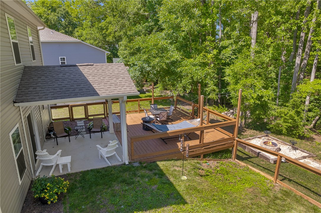 430 Johnson Road Central, SC 29630 - Photo 26 of 36 Discover outdoor living on this expansive back deck, complete with a covered patio and inviting fire pit area.