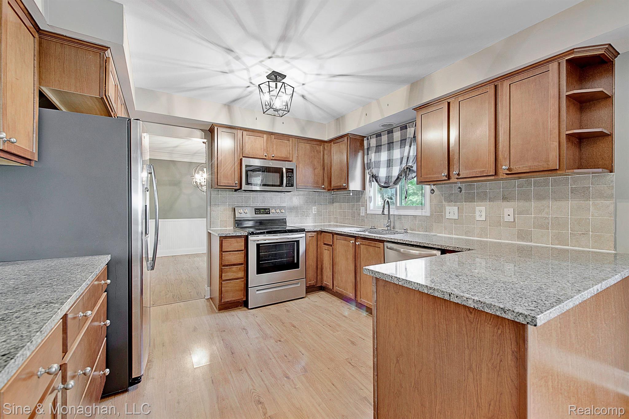 2394 Chalet Drive Rochester, MI 48309 - Photo 10 of 33 Beautiful updated kitchen with all appliances