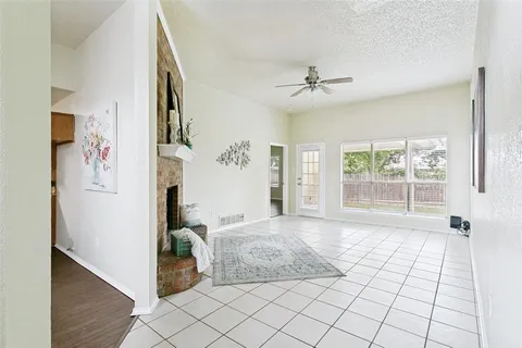 a room that has a bed and a window in it