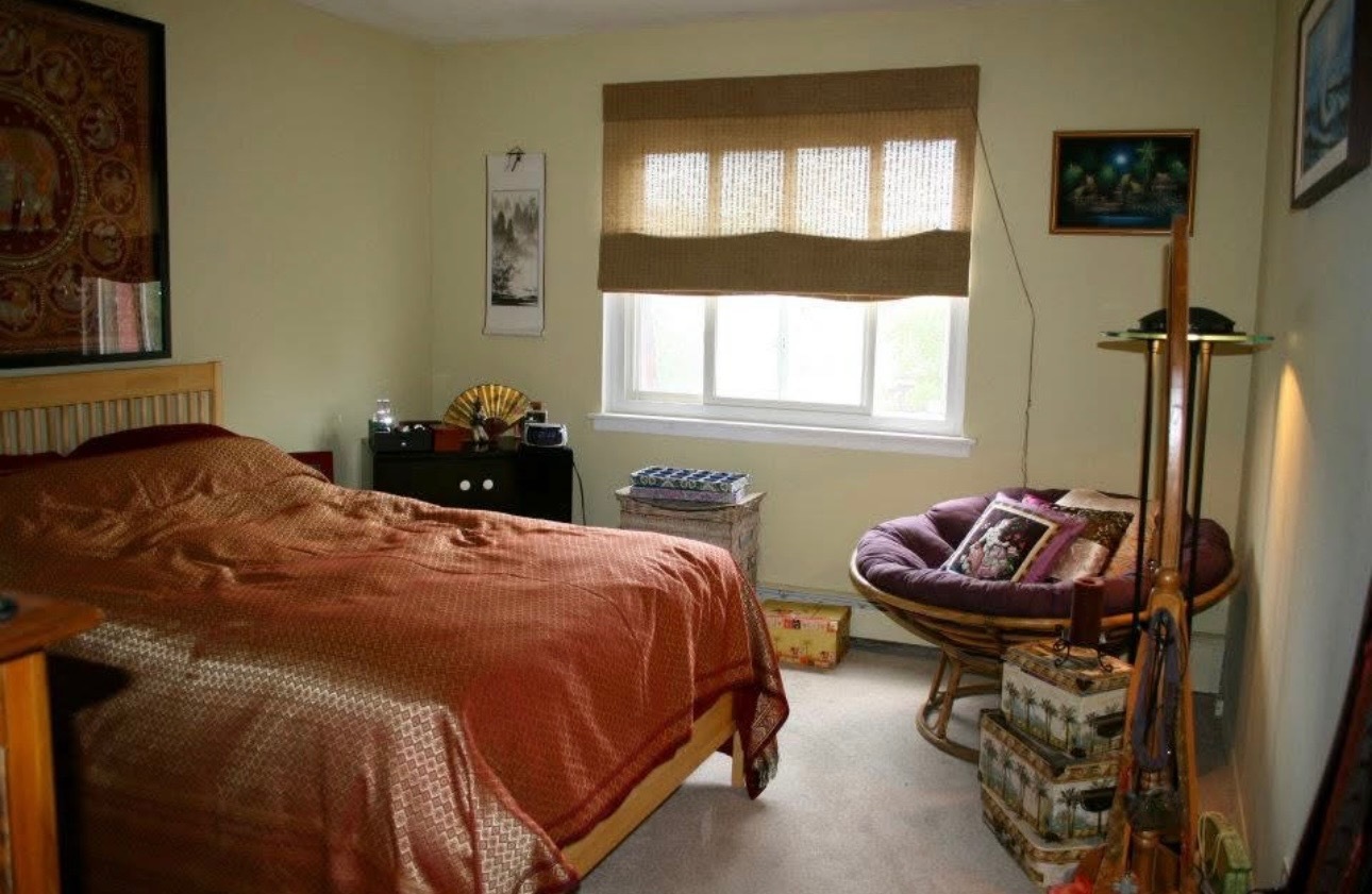 1075 Knoll Lane, Unit 302 Hoffman Estates, IL 60169 - Photo 6 of 11 a bedroom with a bed and dresser with mirror