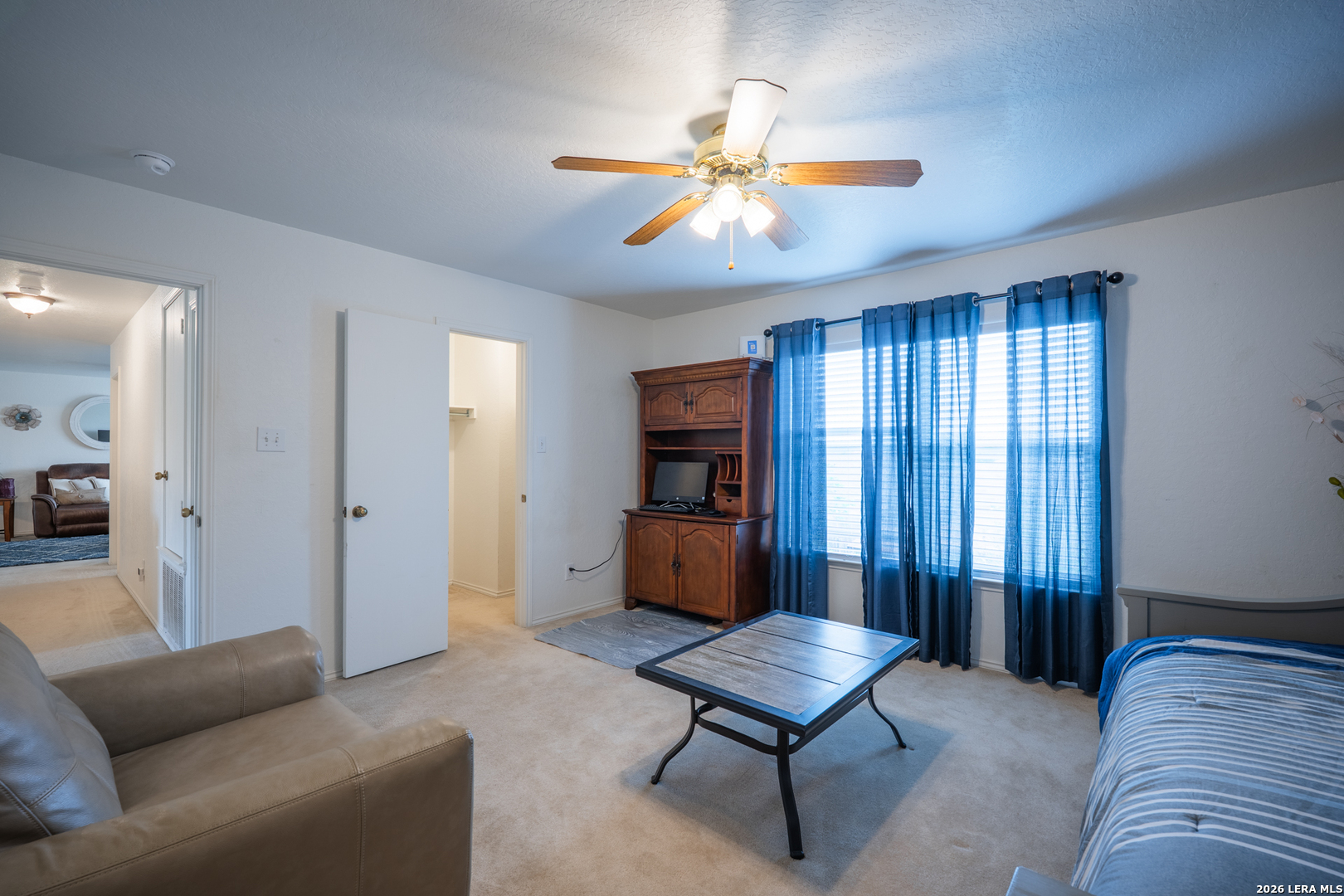 124 Springtree Grove Cibolo, TX 78108 - Photo 25 of 52 a living room with furniture and a window