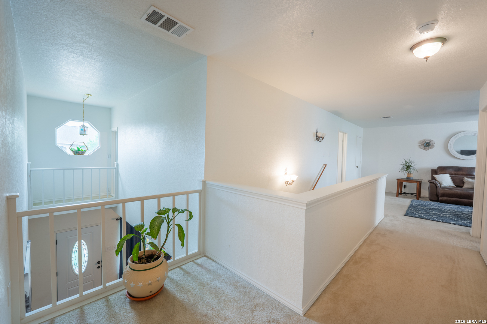 124 Springtree Grove Cibolo, TX 78108 - Photo 29 of 52 a living room with furniture and potted plant