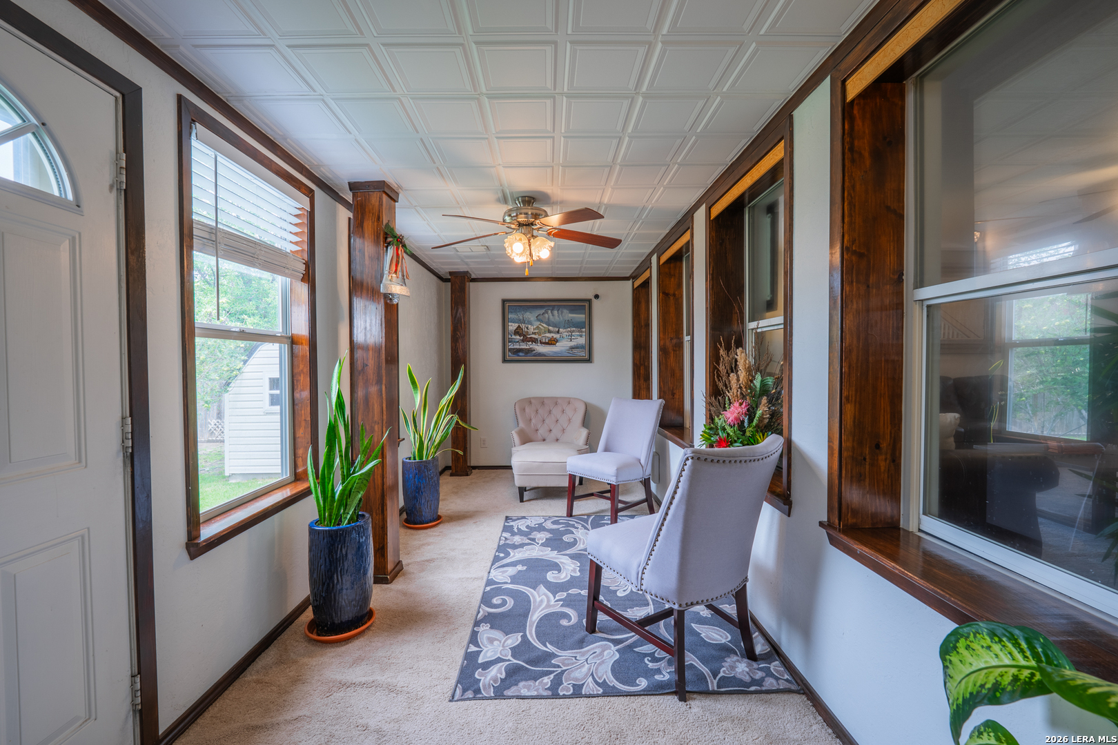 124 Springtree Grove Cibolo, TX 78108 - Photo 40 of 52 a living room with furniture and a large window