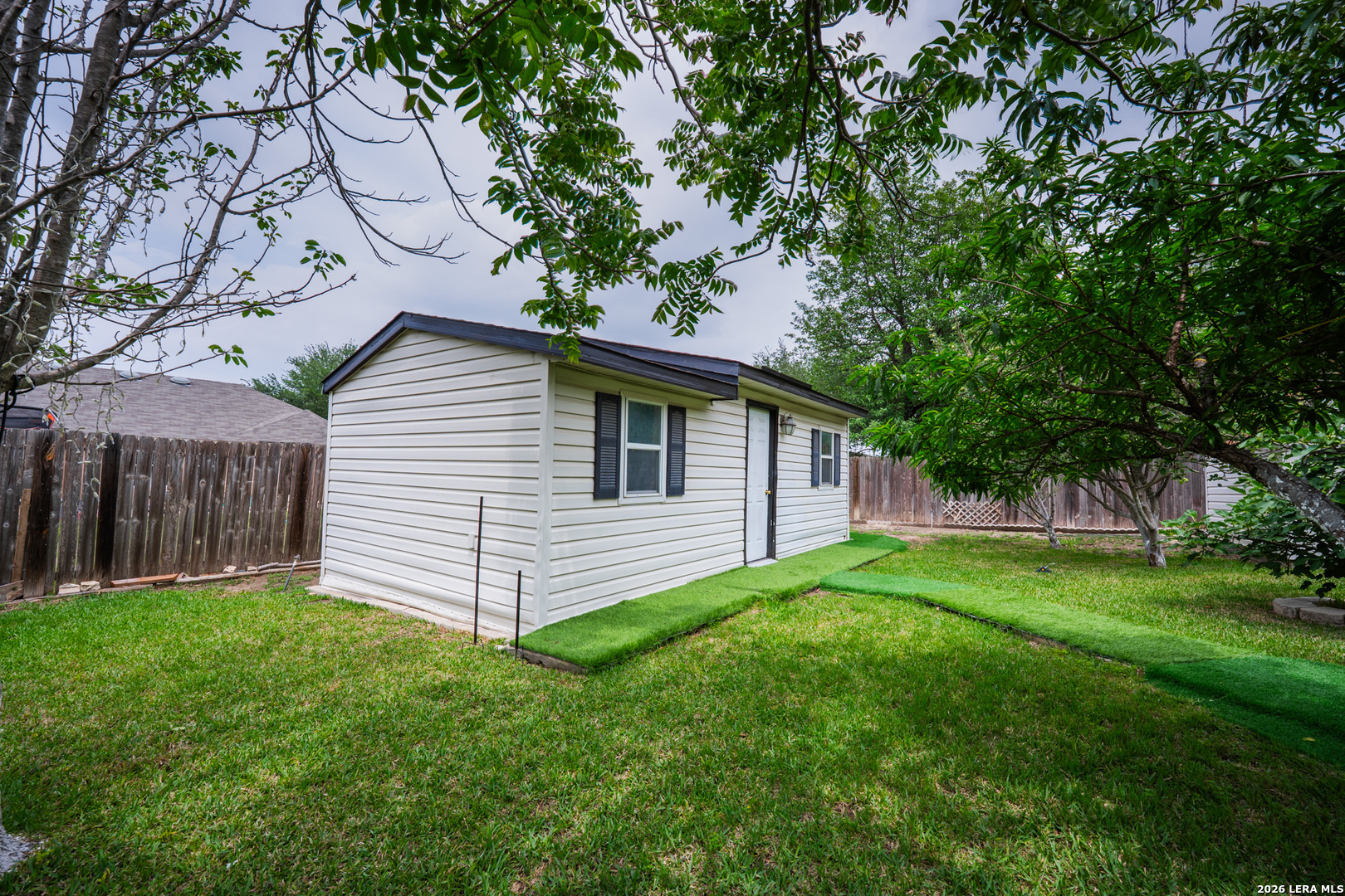 124 Springtree Grove Cibolo, TX 78108 - Photo 47 of 52 a view of a back yard of the house