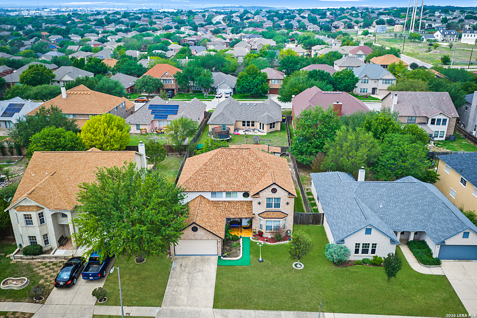 124 Springtree Grove Cibolo, TX 78108 - Photo 52 of 52 an aerial view of multiple houses with yard