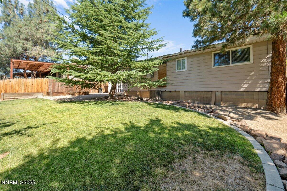3080 Slater Avenue Reno, NV 89503 - Photo 17 of 17 a view of a house with a yard