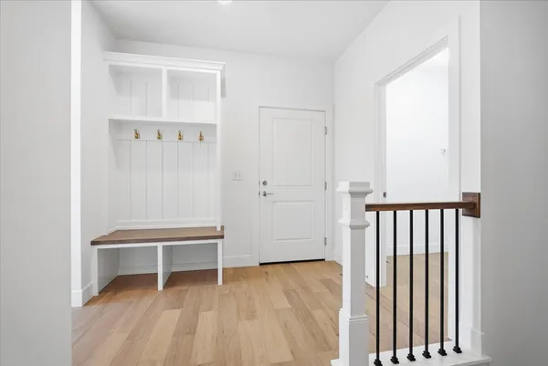 an empty room with a bathroom and a sink