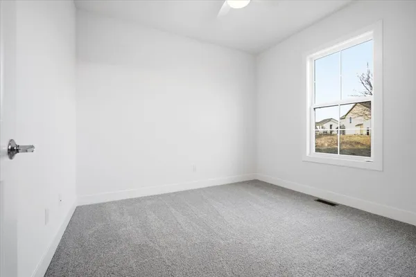 an empty room with a window
