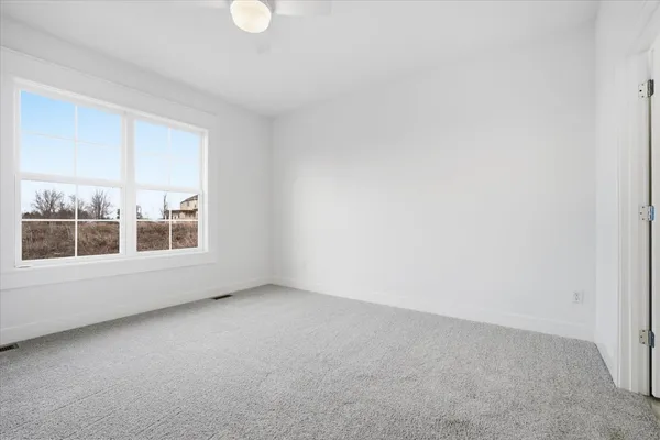 an empty room with an entryway