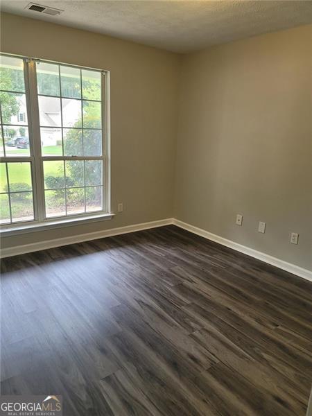 3014 Stirrup Lane Southwest Marietta, GA 30064 - Photo 8 of 10 a view of a room with wooden floor and window