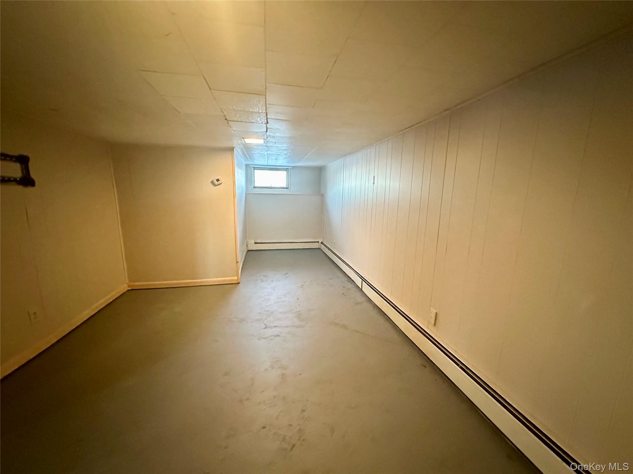 111 Round Hill Road Florida, NY 10921 - Photo 14 of 14 an empty room with a empty space and windows