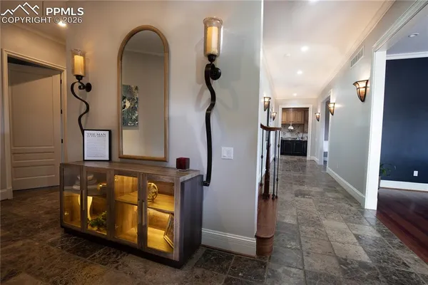 a view of a hallway with entryway