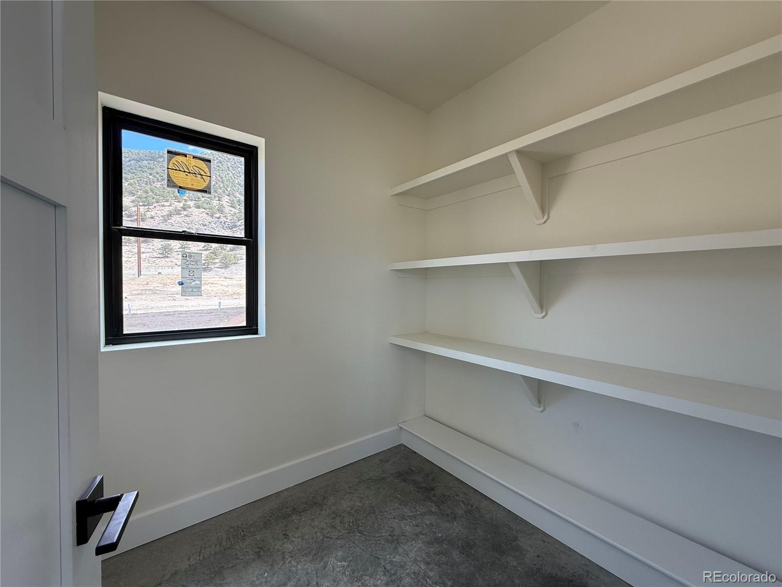 4998 Main Street Salida, CO 81201 - Photo 8 of 31 a view of an empty room with closet