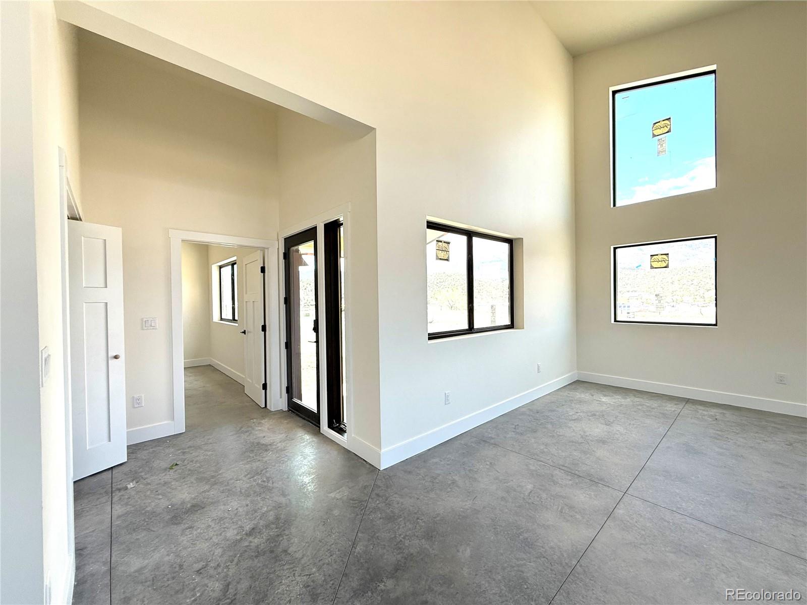 4998 Main Street Salida, CO 81201 - Photo 9 of 31 a view of an empty room with windows