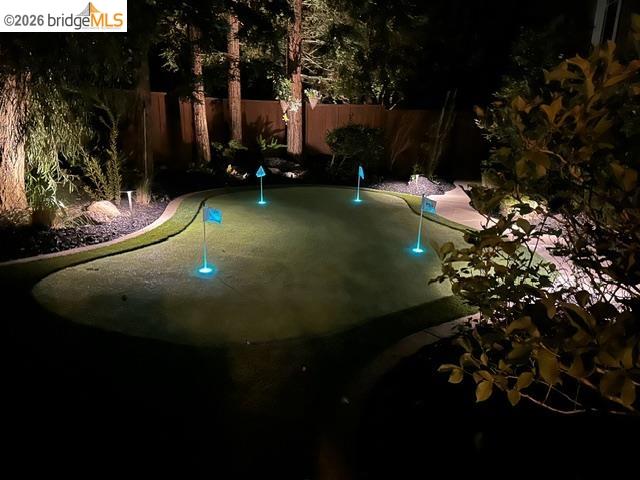 550 Rutherford Circle Brentwood, CA 94513 - Photo 25 of 28 Pool at night with a fenced backyard and a patio area