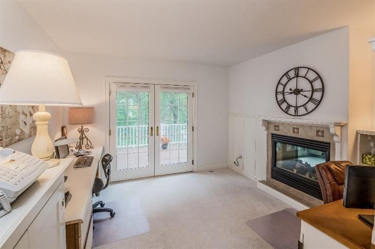 17 Meadowbrook Road Mashpee, MA 02649 - Photo 16 of 29 a view of a livingroom with furniture and a fireplace