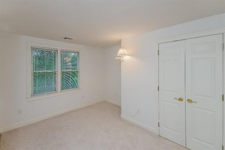 17 Meadowbrook Road Mashpee, MA 02649 - Photo 21 of 29 an empty room with a window