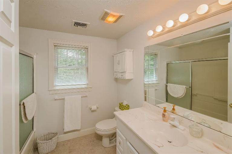 17 Meadowbrook Road Mashpee, MA 02649 - Photo 22 of 29 a bathroom with a sink toilet and shower