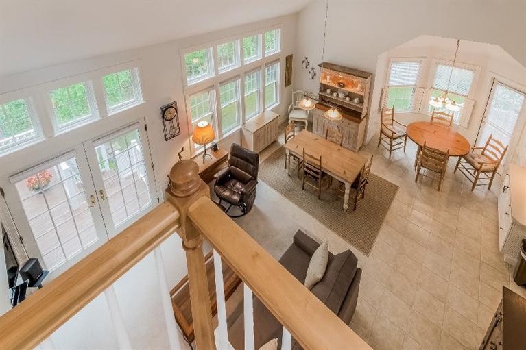 17 Meadowbrook Road Mashpee, MA 02649 - Photo 24 of 29 a living room with furniture and a flat screen tv