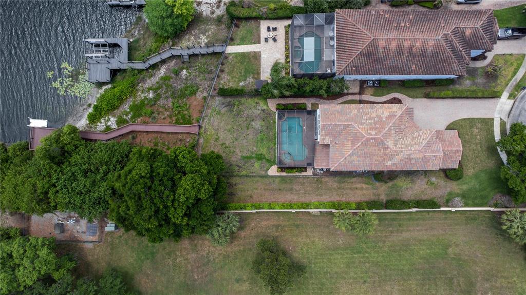 8119 Vía Rosa Orlando, FL 32836 - Photo 44 of 62 an aerial view of residential house with outdoor space and lake view