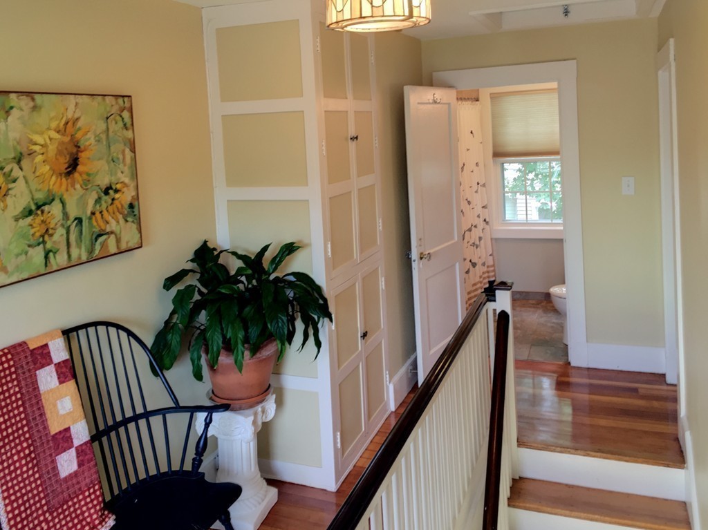 62 Edgehill Road Winthrop, MA 02152 - Photo 12 of 29 a view of a hallway with a potted plant